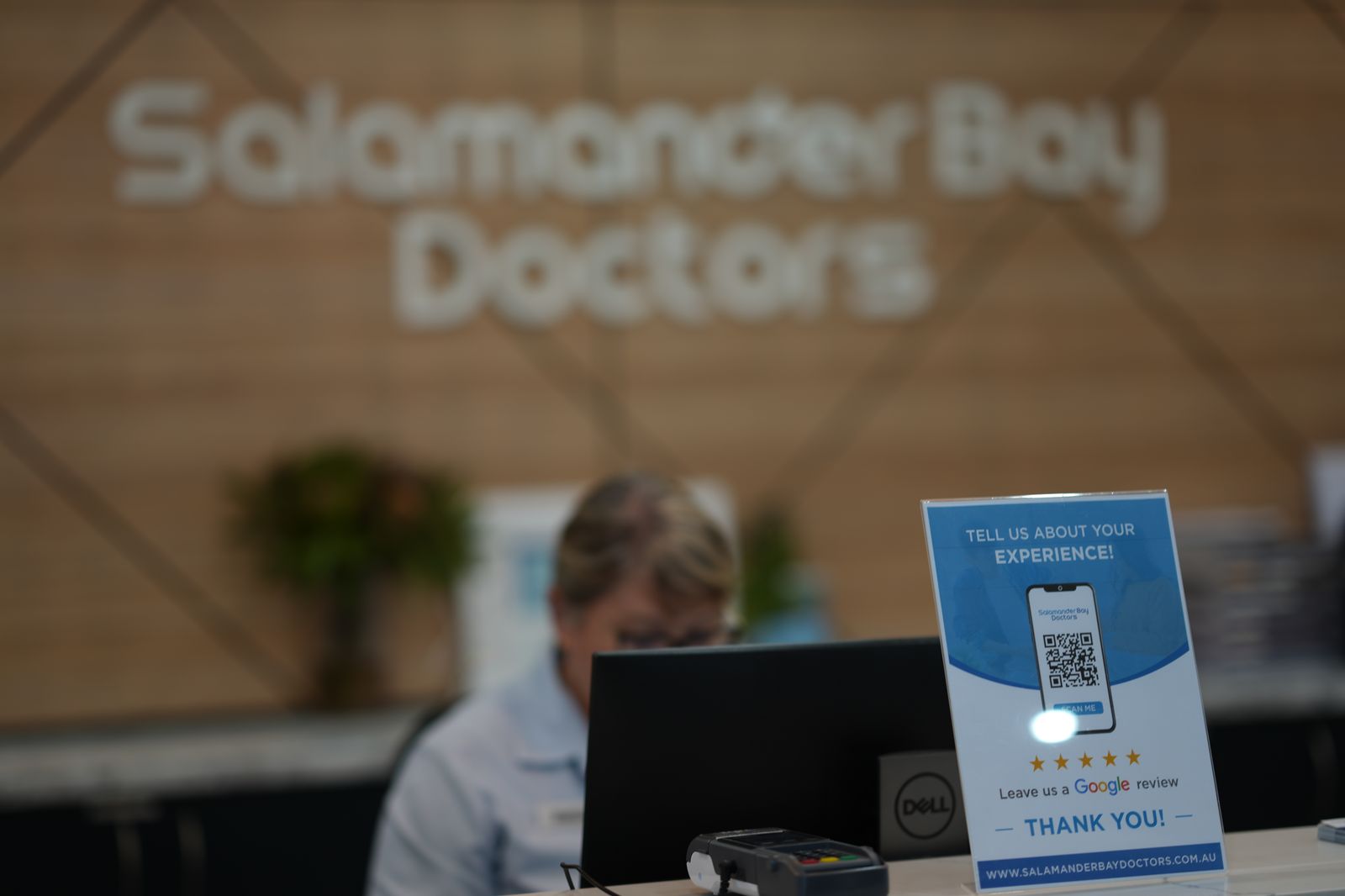 The Salamander Bay Doctors reception desk with the clinic sign behind
