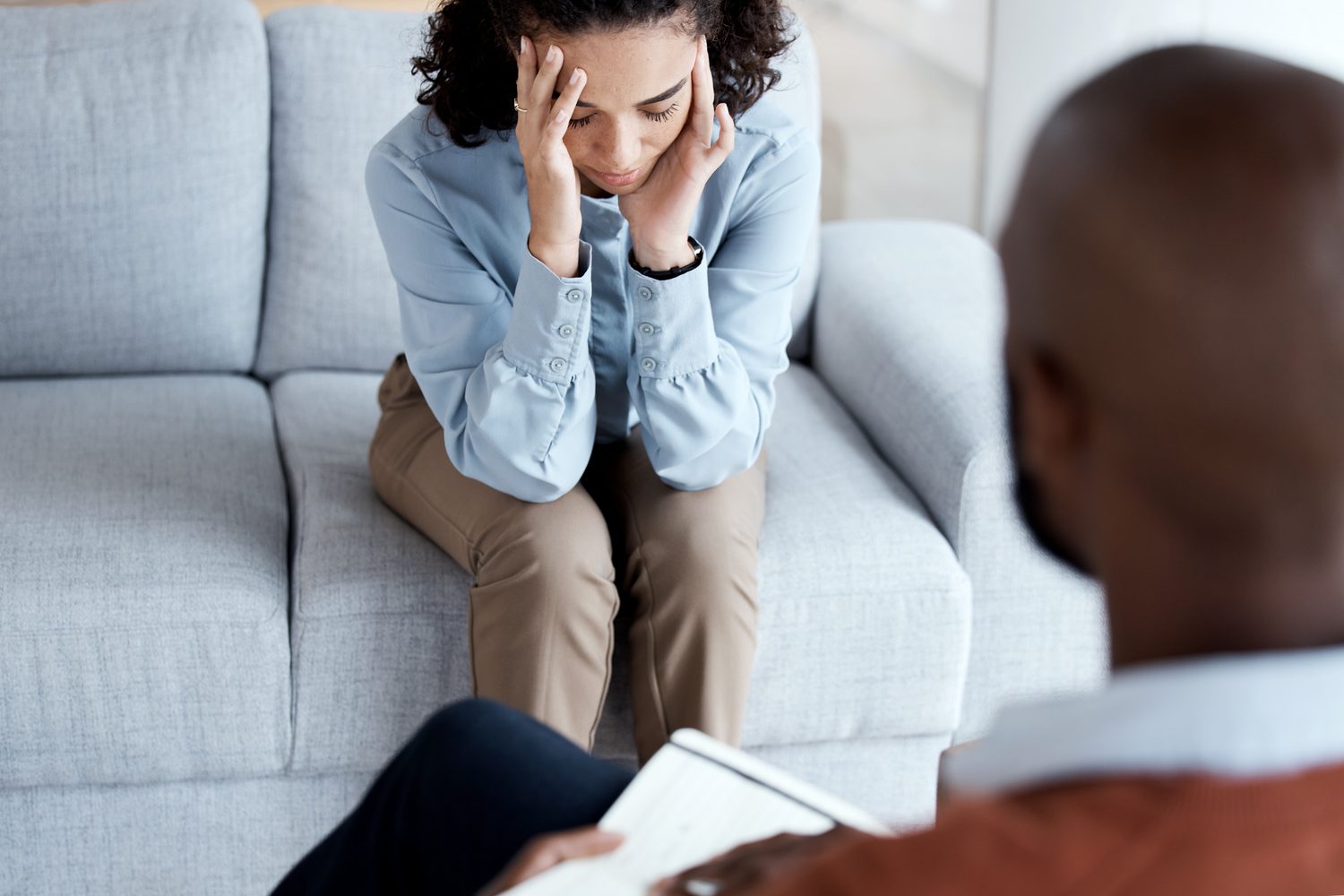 A patient talking with a therapist during a counselling session